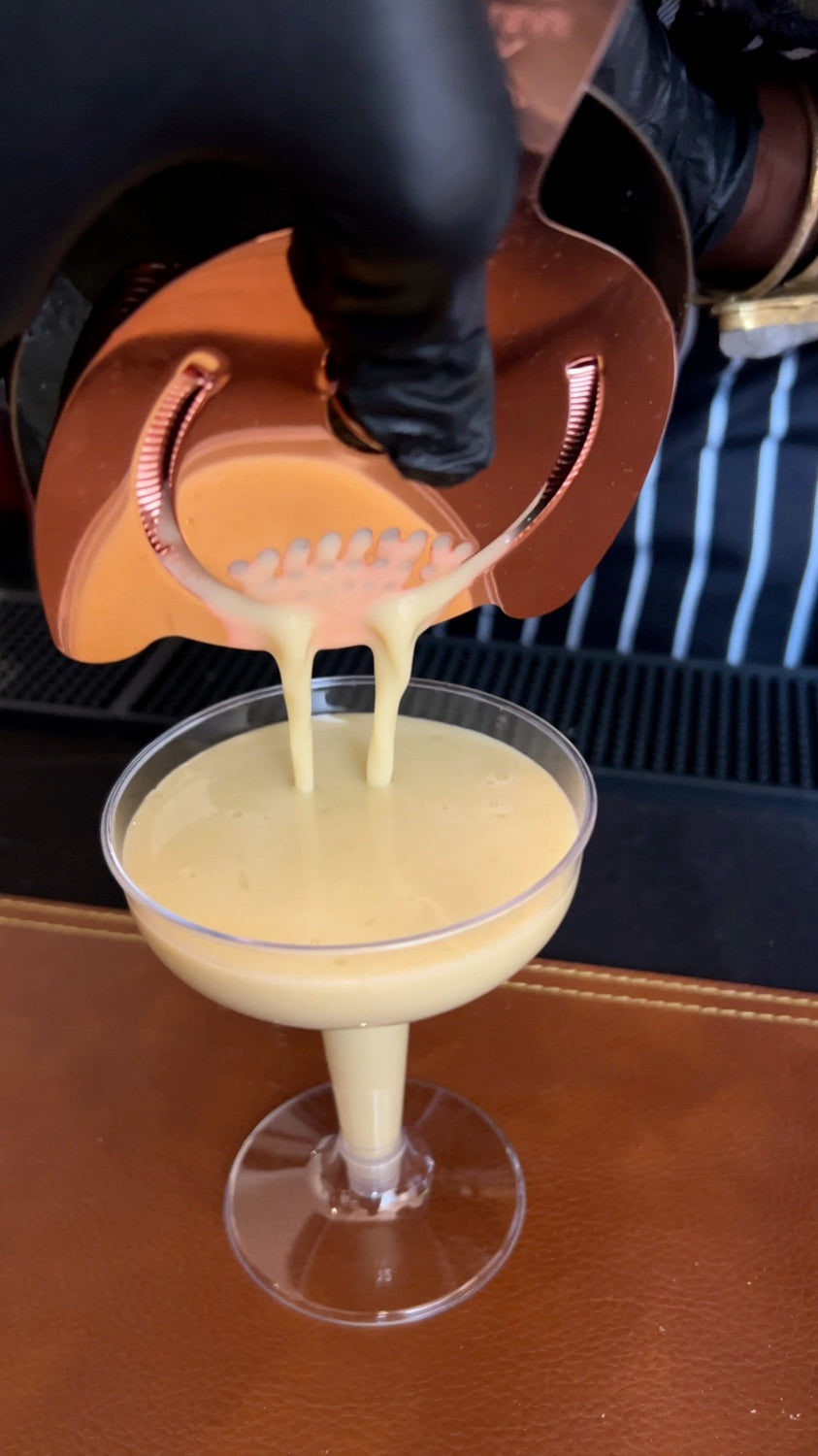 Pouring a Lush by Cajou cocktail